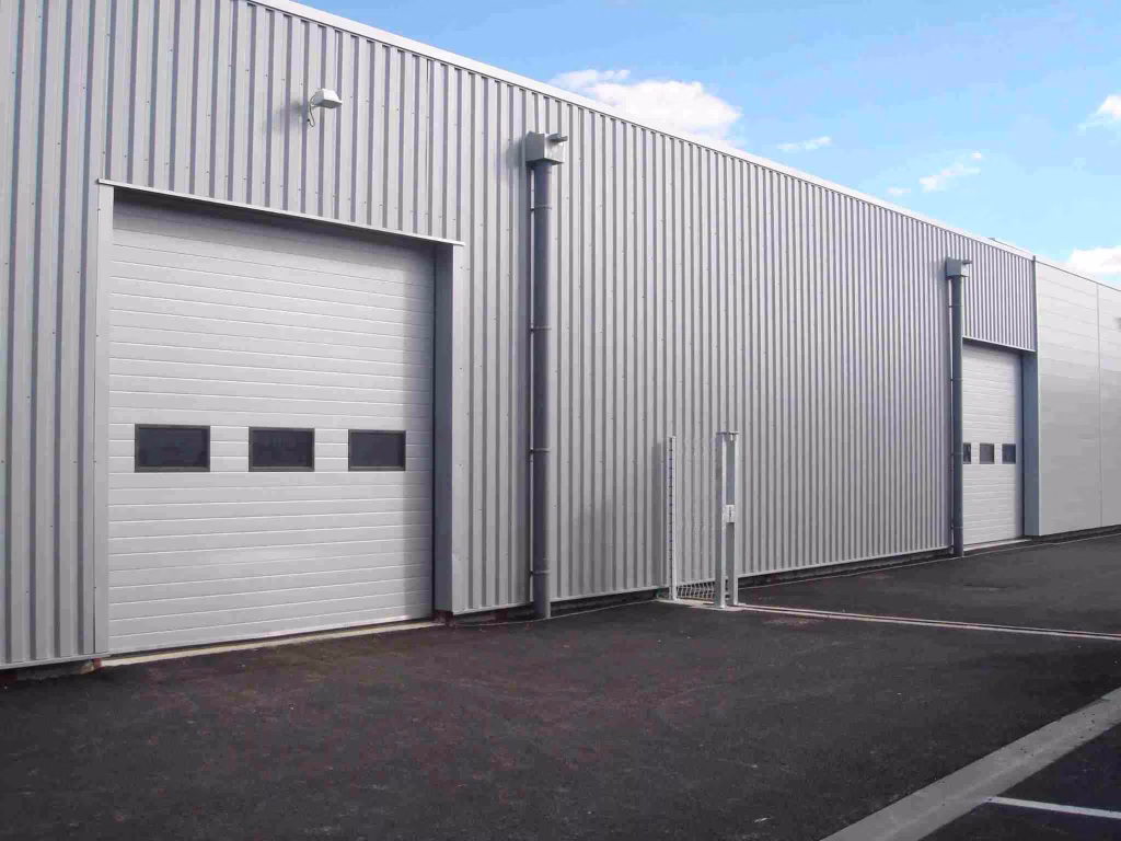 Continuous Production and Benefits of PU-Filled Doors for Garages and Factory/Warehouse Entrances